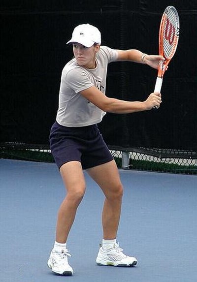 Justine Henin prepares to hit a backhand