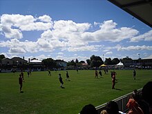 Kiwitea Street in Auckland, New Zealand, hosted the first leg. Kiwitea Street (Freyberg Field).jpg