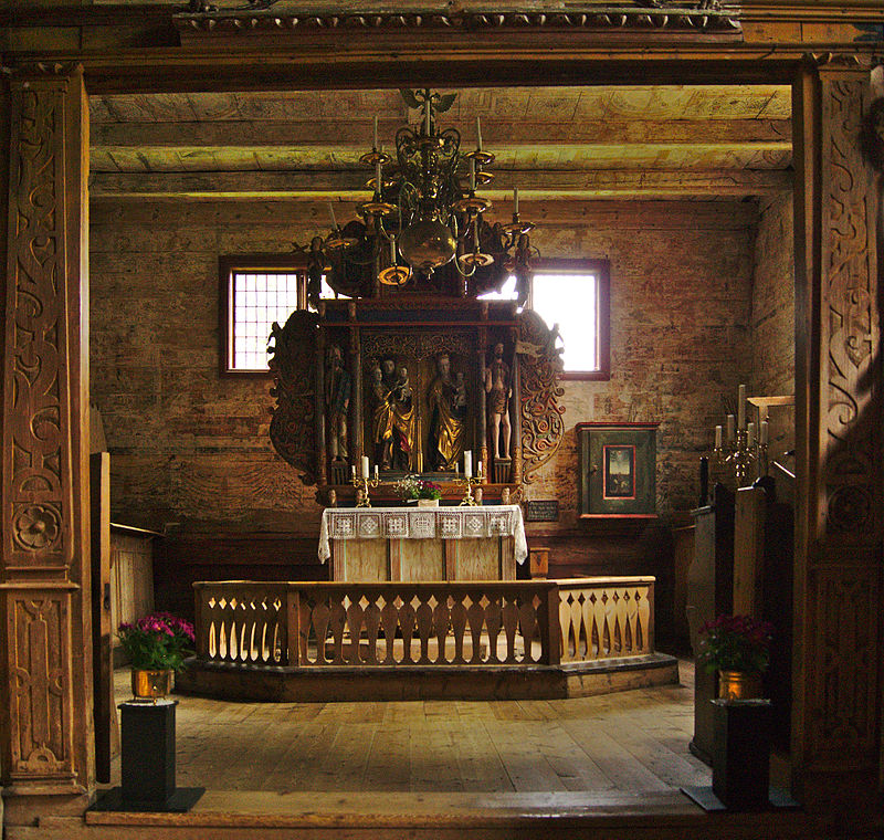 Kvernes Stave Church - Choir division and altarpiece.jpg