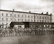 (1925) Missouri State Penitentiary prisoners. Jefferson City, Missouri Line of prisoners at State Penitentiary, Jefferson City, MO.jpg