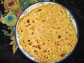 Pakistansk roti, tynt brød stekt på takke, laget på maismel