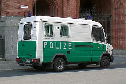 Mercedes Benz police van in Berlin, nicknamed "Wanne" ("Bathtub") in outdated green livery