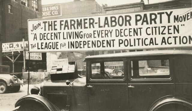 Minnesota Farmer-Labor Party political banner atop a car, circa 1925