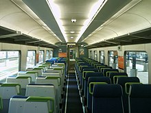 The interior of an SE carriage, formerly used on Metlink peak services in Wellington. NZR-EA-Wellington3.jpg