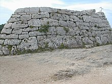 This is a naveta from the site of Naveta des Tudons found on the western end of Menorca Naveta Tudons.jpg