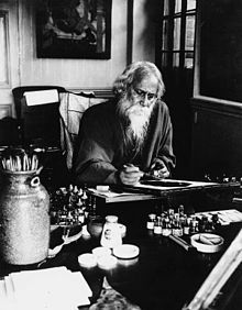 Rabindranath Tagore at his painting desk, Government School of Art, Calcutta 1932.jpg
