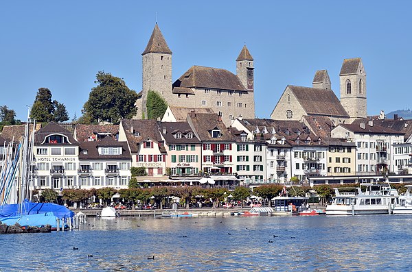 Rapperswil harbour, as seen from Seedamm, Fischmarktplatz to the right, Rapperswil castle and Stadtpfarrkirche (St. John's Church) in the background (