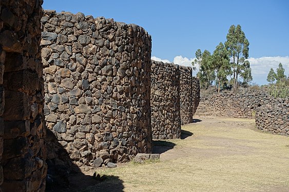 Inca food store towers in Raqchi, Peru