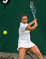 Sara Sorribes Tormo competing in the first round of the 2015 Wimbledon Qualifying Tournament at the Bank of England Sports Grounds in Roehampton, England. The winners of three rounds of competition qualify for the main draw of Wimbledon the following week.