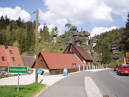 Schüttersmühle - place name sign and Weiherbacher Männchen rock formation