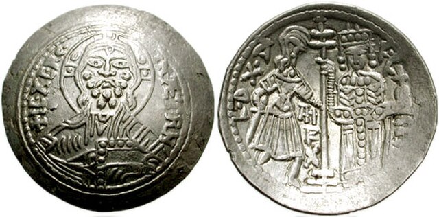 AR Scyphate Ducalis, dated year 10 (1140), after the king's victory on 25 July. Obverse: Christ. Reverse: King Roger and Duke Roger.