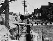 Installing E. 80th Street pipeline, Seattle, Washington, USA, 1931