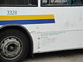 Legal lettering on the nearside of Southern Vectis 3328 (HW54 DBZ), a Dennis Dart SLF/Plaxton Pointer 2. It was parked up in Ryde, Isle of Wight bus station at the time. The old legal lettering for the Isle of Wight Council from when the bus was in operation with Wightbus can still be seen underneath.