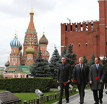 The Soyuz TMA-06M crew members conduct their ceremonial tour of Red Square on 25 September 2012. Soyuz TMA-06M crew at the Kremlin Wall.jpg