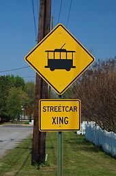 Sign alerting motorists to a level crossing of the streetcar line Streetcar crossing sign - Fort Smith, Arkansas (2008).jpg