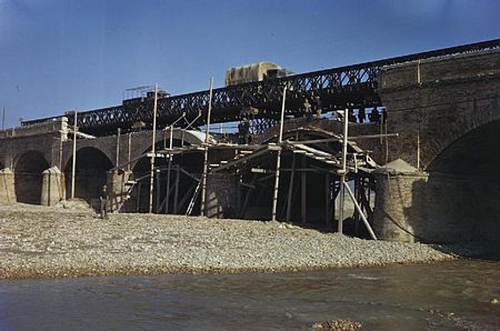 A demolished bridge in Italy repaired by the RE using Bailey sections. The British Army in Italy, 1944 TR2612.jpg