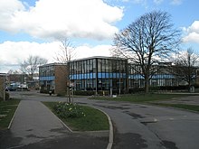 Main entrance into the school; part of the main block is shown. The Petersfield School entrance.JPG