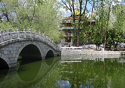 The path led past the Potala to a pond The quiet and peaceful park, pond, and chapel behind the Potala.jpg