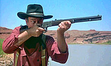 John Wayne aims a Model 92 rifle in The Searchers. The searchers Ford Trailer screenshot (8-crop).jpg