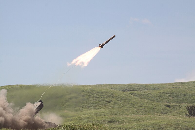 File:Type92 Mine clearing vehicle launch its mine clearing line charges.jpg