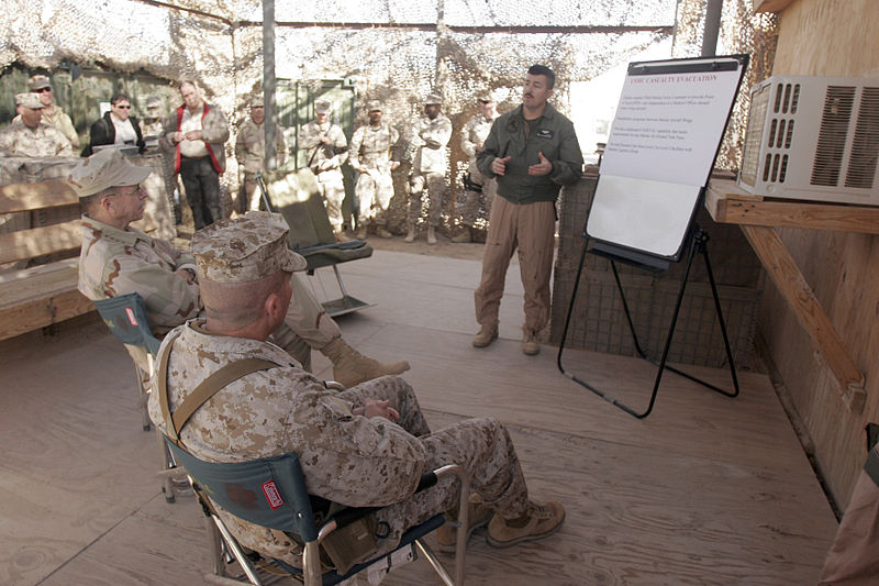 File:US Navy 060102-M-6018F-011 Senior Chief Hospital Corpsman Robert E. Brown, assigned to Marine Medium Helicopter Squadron One Six One (HMM-161) briefs the Chief of Naval Operations (CNO), Adm. Mike Mullen.jpg
