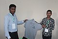 Zeetendra Giving T-Sirt To Kiran Kumar Sah During 1st Anniversary Of MWUG & Felicitation Program