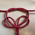 ‎Step 2 Tying a soft shackle button as rose knot on 2 ropes
