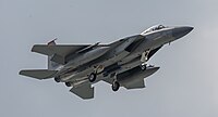 A US Air Force F-15C Eagle, tail number 85-0098, on final approach at Kadena Air Base in Okinawa, Japan. The aircraft is assigned to the 67th Fighter Squadron.