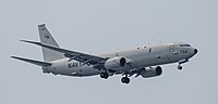 A US Navy P-8 Poseidon, tail number 168756, on final approach at Kadena Air Base in Okinawa, Japan.