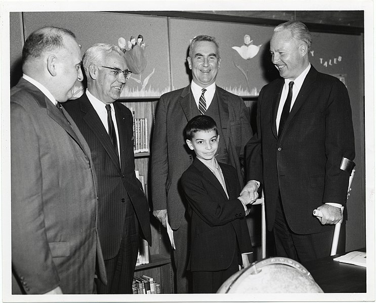 File:An unidentified boy shakes hands with Mayor John F. Collins as Lenahan O'Connell, esp., Erwin Canham and Augustin Parker watch (12306245145).jpg