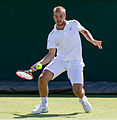 Andrej Martin competing in the first round of the 2015 Wimbledon Qualifying Tournament at the Bank of England Sports Grounds in Roehampton, England. The winners of three rounds of competition qualify for the main draw of Wimbledon the following week.