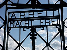 The gate at the Jourhaus building through which the prisoners' camp was entered contains the slogan, Arbeit macht frei, or 'Work Sets You Free.' Arbeit Macht Frei Dachau 8235.jpg