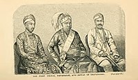Ayilyam Thirunal of Travancore (centre) with the first prince (left) and Dewan Rajah Sir T. Madhava Rao (right).