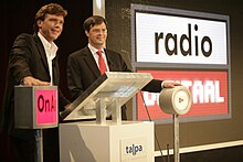 The launch of a commercial online radio platform by John de Mol (left) and Jan Peter Balkenende. Balkenende en John de Mol jr.jpg