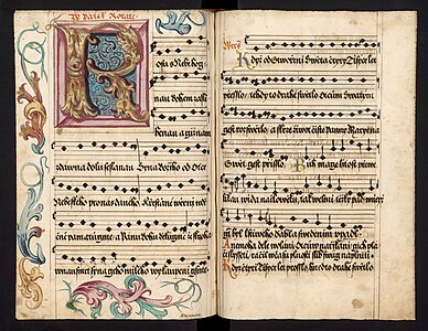 Úvod pátečních rorátů s iluminovanou iniciálou „R“ v knize ranních adventních zpěvů velvarských literátů. Literátské bratrstvo Velvary, Rorátník (kolem 1590 – kolem 1720), nezprac. fond.