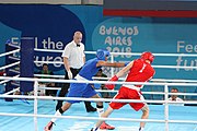 Deutsch: Boxen bei den Olympischen Jugendspielen 2018 Tag 12, 18. Oktober 2018 - Kampf um die Bronzemedaille im Fliegengewicht Mädchen – Timur Merjanow (Usbekistan, rot) schlägt Youssef Ali Karar Ali (Ägypten, blau) 5-0; Ringrichter ist Antonín Gaspar (Tschechien). English: Boxing at the 2018 Summer Youth Olympics on 18 October 2018 – Boy's heavyweight Bronze Medal Bout - Timur Merjanov (Uzbekistan, red) beats Youssef Ali Karar Ali (Egypt, blue) 5-0; Referee is Antonín Gaspar (Czech Republic). Español: Boxeo en los Juegos Olímpicos Juveniles de Verano de 2018 en 18 de octubre de 2018 - Medalla de bronce de peso pesado del muchacho: Timur Merjanov (Uzbekistán, roja) le gana a Youssef Ali Karar Ali (Egipto, azul) 5-0; El árbitro es Antonín Gaspar (Republica checa).