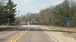 Looking north at the sign for Brockway on U.S. Route 12