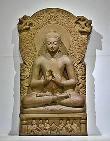 Una estatua de Buda de Sarnath, Uttar Pradesh, India, siglo IV EC.  Se representa al Buda enseñando, mientras hace el mudrā Dharmacakra Pravartana.