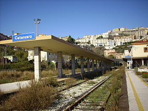 View of the abandoned station in 2010. In background the city centre and the tunnel of Sansinato. In the left side, behind the roof, it is possible to see the FC station building.