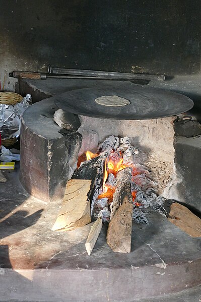 File:Chapati making at the Chokhi Dhani Resort Panchkula 08.jpg