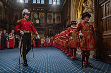 Yeomen of the Guard embarking on their traditional search of the cellars prior to the State Opening (2022). Checking the cellars - 52063713654.jpg