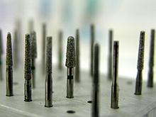 A collection of various burrs used in dentistry. Drill long.jpg