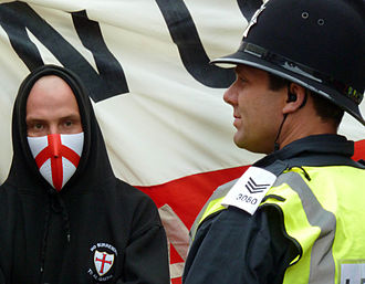 EDL supporter and a police officer at an EDL march EDL4.jpg