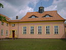School with two teachers' houses