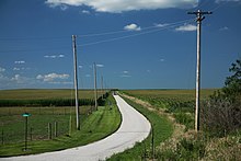 Corn fields in Central Illinois. Farm road, Champaign County.jpg