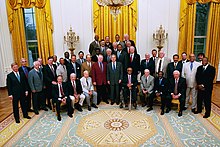 Will (at far left) with members of the Baseball Hall of Fame and George W. Bush at the White House in 2004