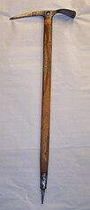 A wooden handled ice axe from the mid-1970sLength: .mw-parser-output .frac{white-space:nowrap}.mw-parser-output .frac .num,.mw-parser-output .frac .den{font-size:80%;line-height:0;vertical-align:super}.mw-parser-output .frac .den{vertical-align:sub}.mw-parser-output .sr-only{border:0;clip:rect(0,0,0,0);height:1px;margin:-1px;overflow:hidden;padding:0;position:absolute;width:1px}75 cm (29+1⁄2 in)Weight: 840 g (29+1⁄2 oz)
