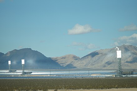 The 377 MW Ivanpah Solar Electric Generating System with all three towers under load, February 2014. Taken from I-15.