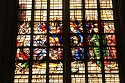 English: Detail of the stained-glass window number 23 in the Sint Janskerk at Gouda, Netherlands: Central part - "Jesus washing Peter's feet"