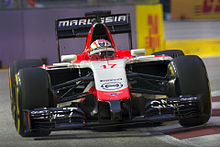 Photo de face de la Marussia MR03 de Bianchi, les roues gauches sur le vibreur, à Singapour